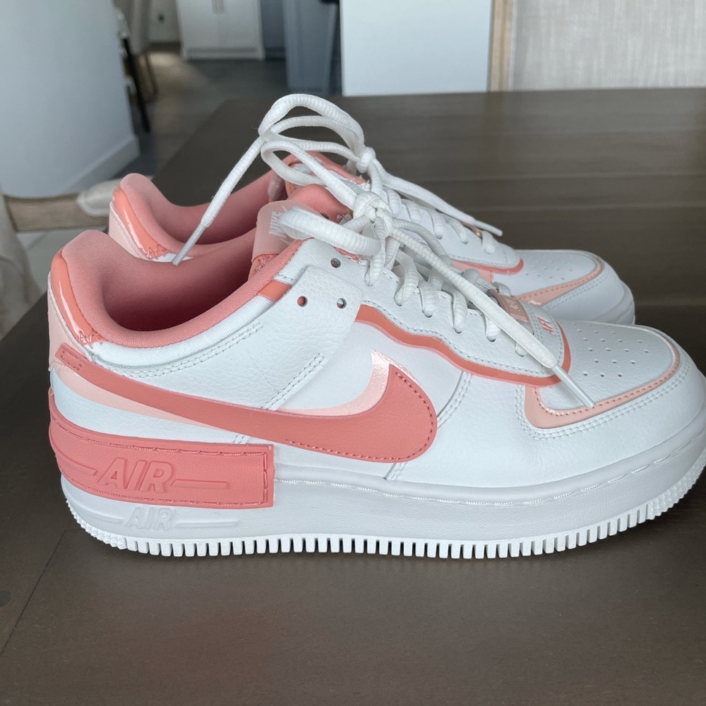 Nike Air Forces in “coral”